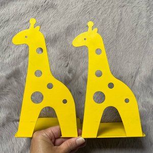 Cute yellow metal giraffe bookends